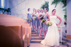 bride and bridesmaids on stairwell